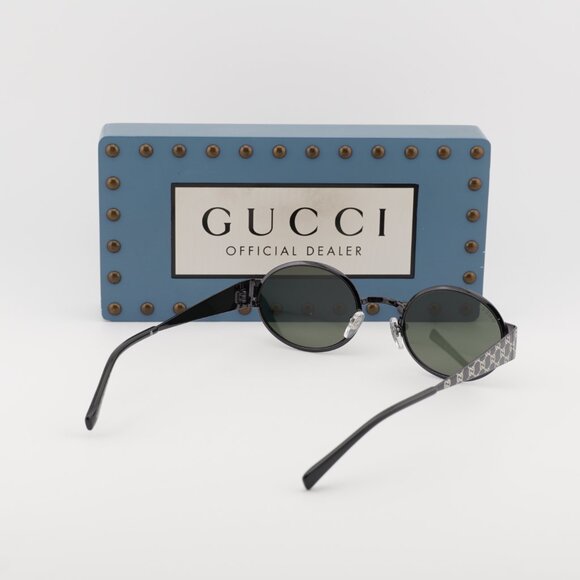 Gucci GG1854S 001 Oval Sunglasses – Ruthenium/Grey